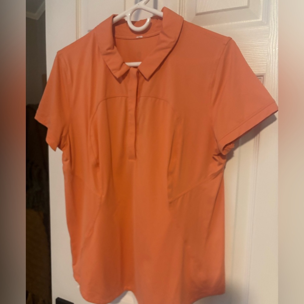 Lululemon Woman's Polo Shirt Size L color is orange/salmon